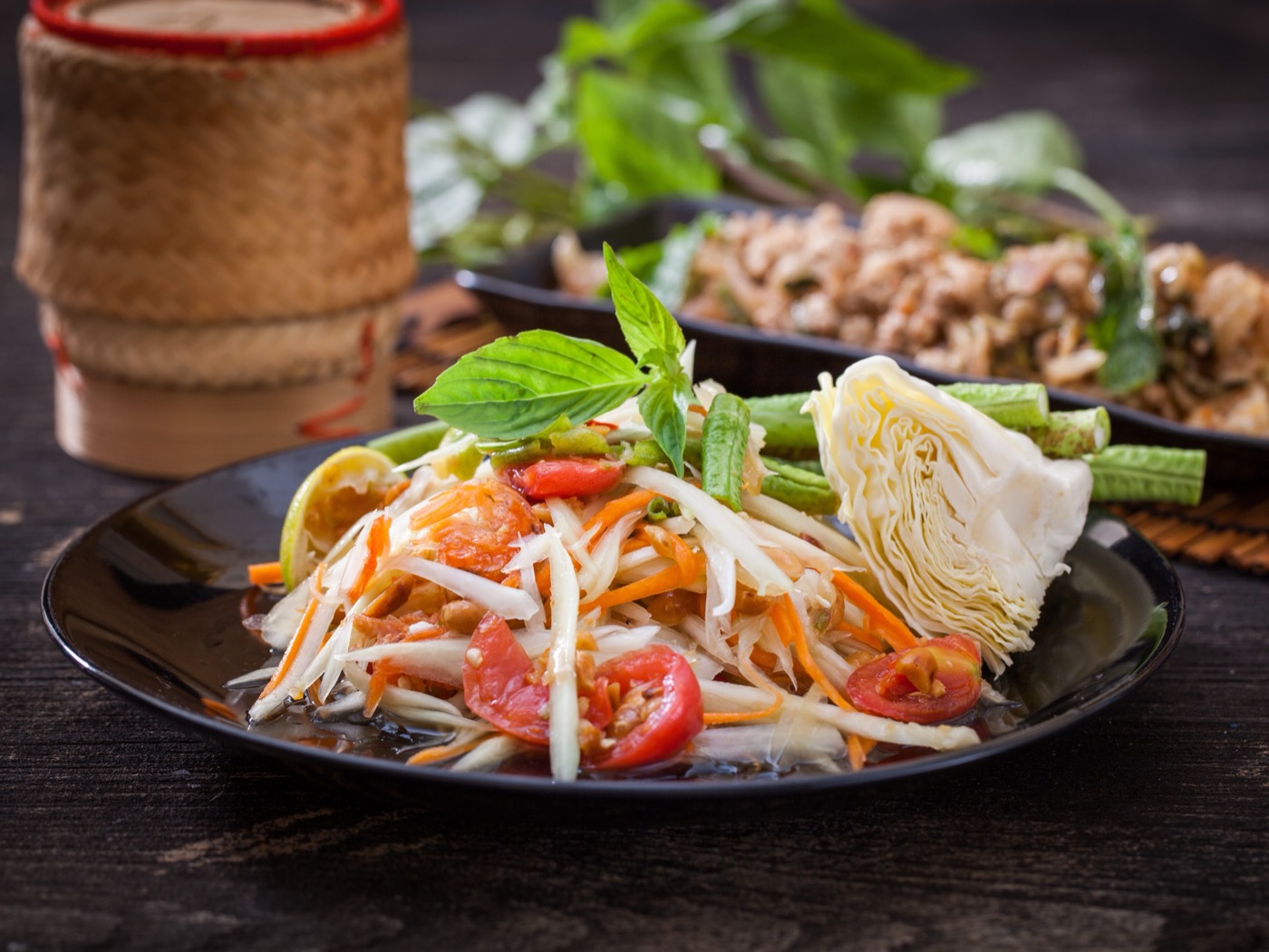 Som Tum papaya salad with tomato and sticky rice